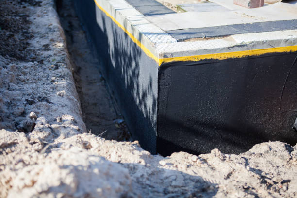 Professional Emergency Waterproofing technician working in Newtown, PA